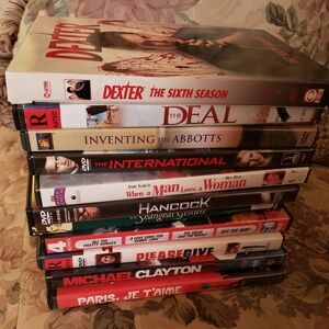 Lot of DVD movies DEXTER MEG RYAN GEORGE CLOONEY and More..
